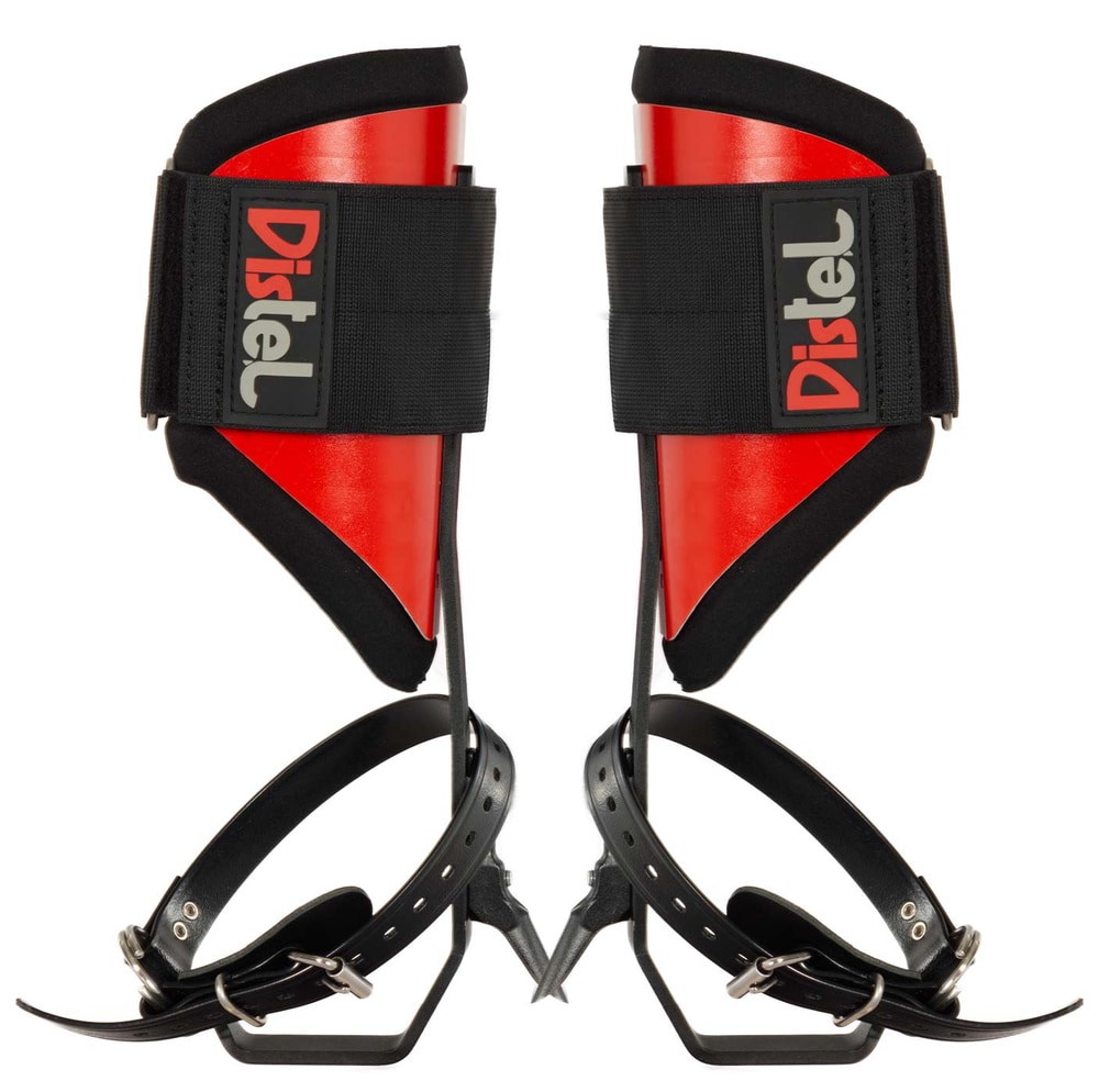 Distel Steel Classic, deux patins en métal rouge et noir avec sangles noires et l’inscription « Distel » sur les fermetures velcro noires