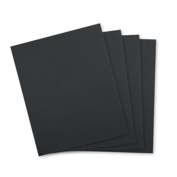 Tissu patch noir, quatre morceaux de tissu carrés posés les uns sur les autres