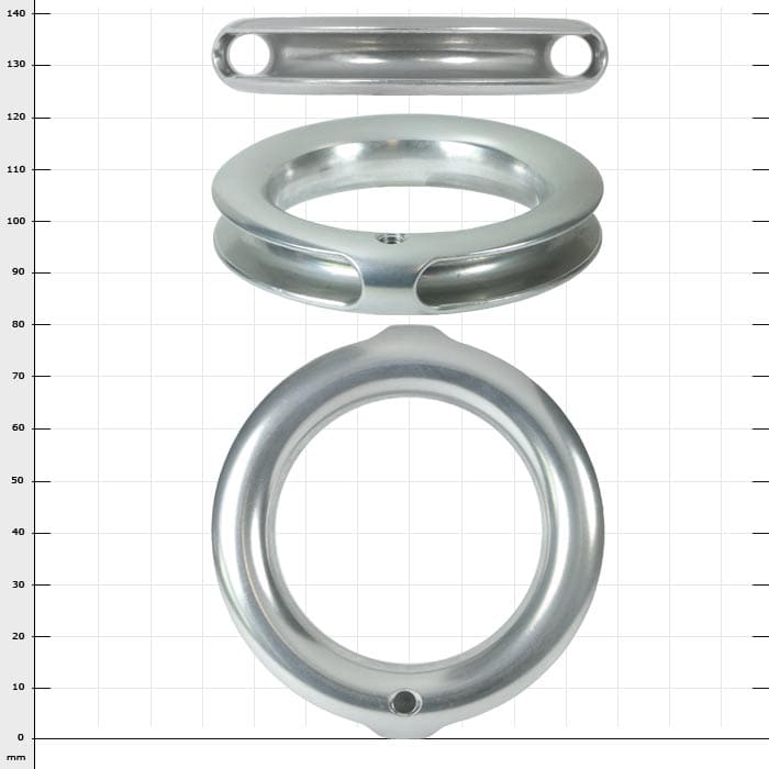 TunnelRing RG80, trois pièces métalliques argentées de différentes formes et tailles, disposées sur un fond à carreaux