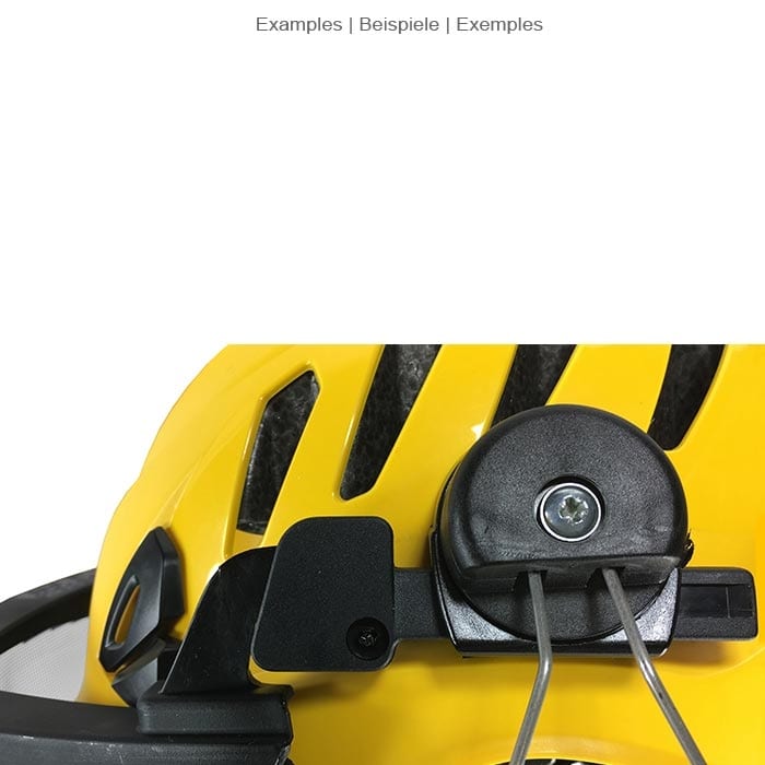 Gros plan sur le mécanisme de fixation de la visière transparente ECC sur un casque jaune avec des aérations noires et une fermeture noire