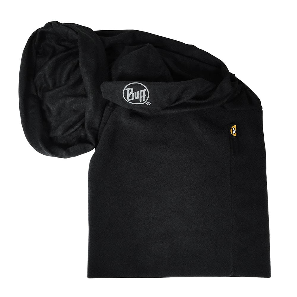 Polar BUFF en noir, plié, morceau de tissu doux avec logo Buff imprimé et petite étiquette jaune