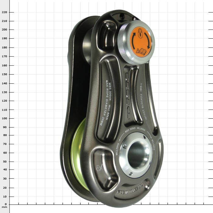 Impact Block L, bloc en métal gris avec roue verte et cadran supérieur orange