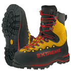 Chaussures de montagne Zugspitze Extreme en jaune et noir avec lacets rouges, semelle crantée et inscription « EXTREME » rouge sur le côté