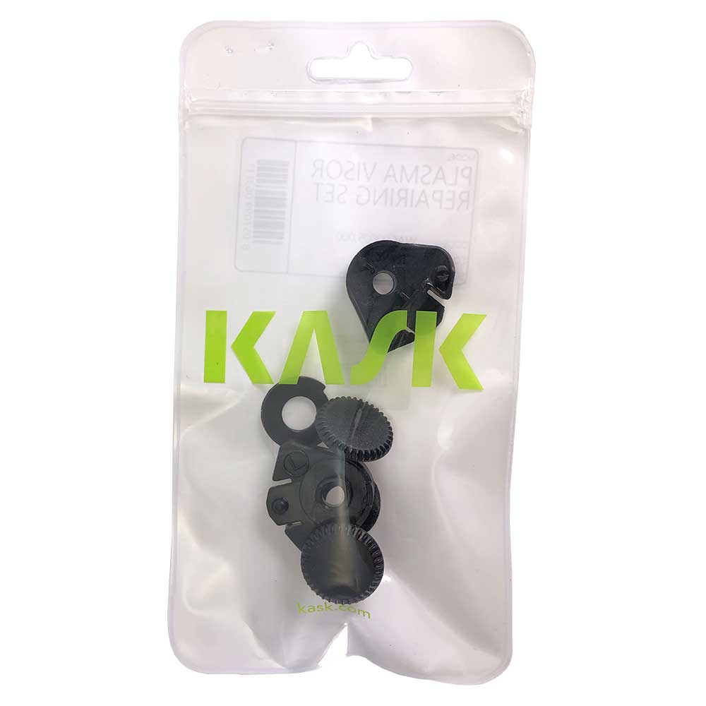 Kit de montage de visière Kask dans un emballage en plastique transparent refermable avec le logo Kask vert et plusieurs pièces en plastique noir visibles à l’intérieur.