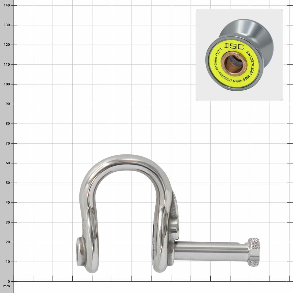 Ultra Link Small d’ISC, une manille argentée dont le boulon a été retiré, à côté un gros plan du rouleau gris en forme de tambour avec un autocollant jaune