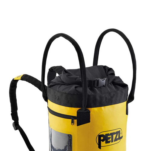 Conteneur PETZL Bucket 30 jaune et noir avec sangles de transport et poche zippée, vue latérale