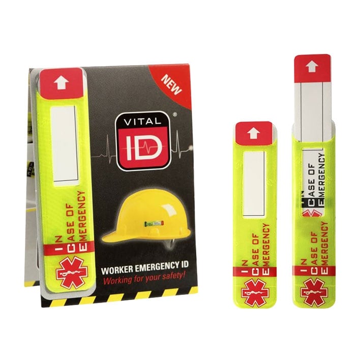Vital ID d’urgence jaune avec flèche rouge et texte « EN CAS D’URGENCE » et emballage avec casque jaune, fabricant Vital ID