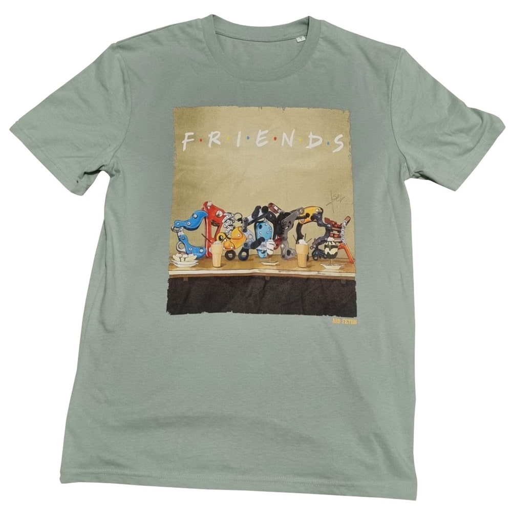T-shirt avec l’impression « Friends » et une illustration de pièces mécaniques de différentes couleurs sur une table, titre « Friends » visible