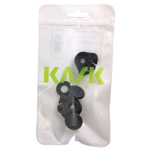 Kit de montage de visière Kask dans un emballage en plastique transparent refermable avec le logo Kask vert et plusieurs pièces en plastique noir visibles à l’intérieur.