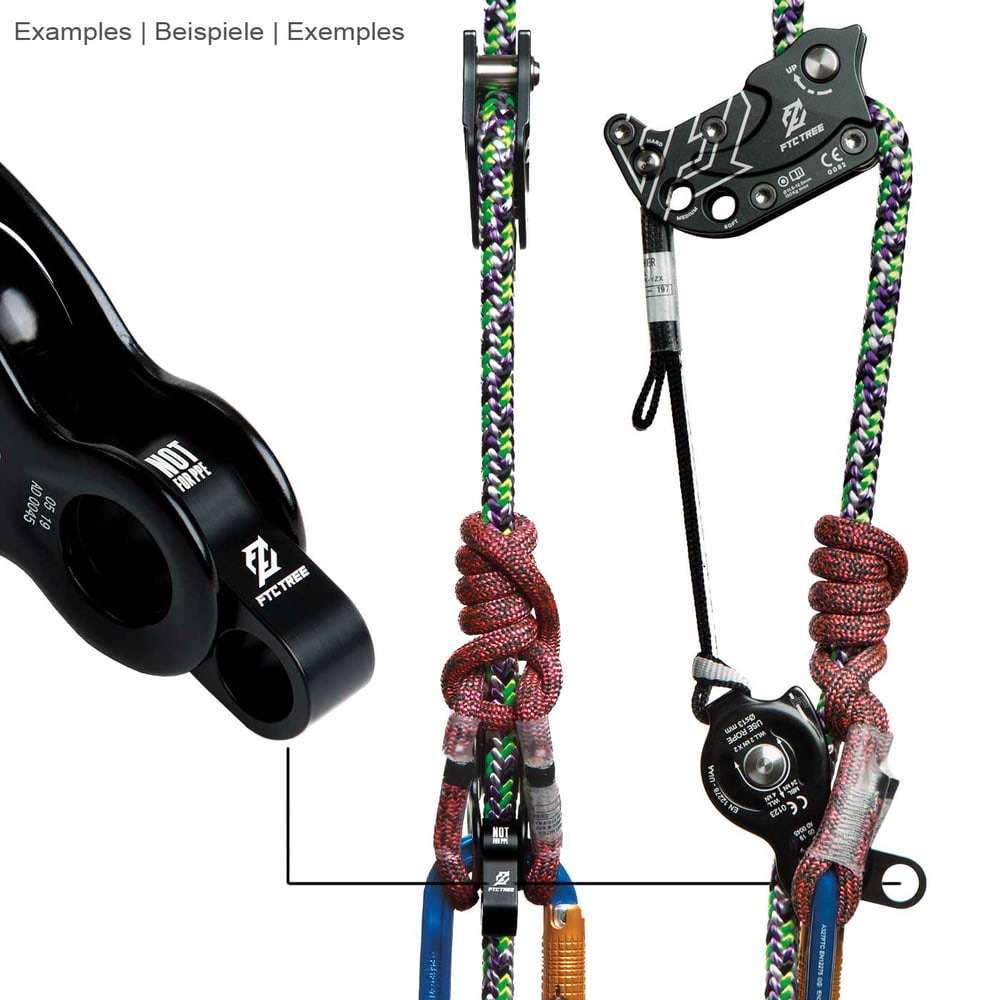 Rise-Up de FTC TREE, pièce en métal noir avec deux ouvertures rondes, attachée à des cordes d’escalade colorées et des mousquetons