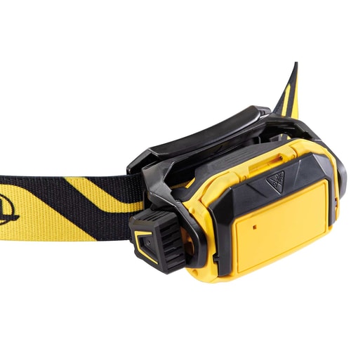 Phare arrière Petzl Pixa avec compartiment à piles visible et bandeau jaune et noir