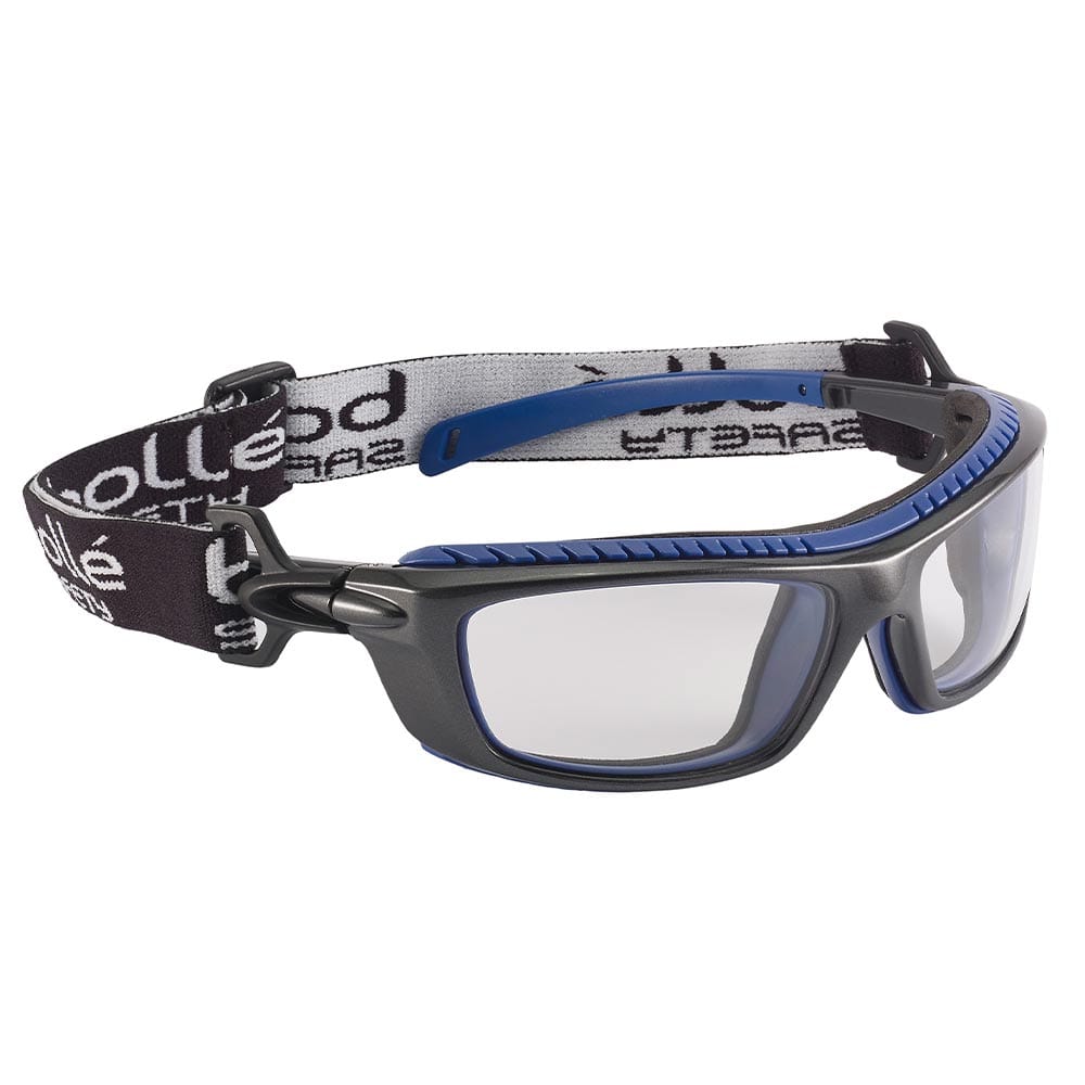 Lunettes de sécurité Bollé Baxter avec verres transparents et noir, monture bleue et bandeau noir avec lettres blanches, vue de l’autre côté