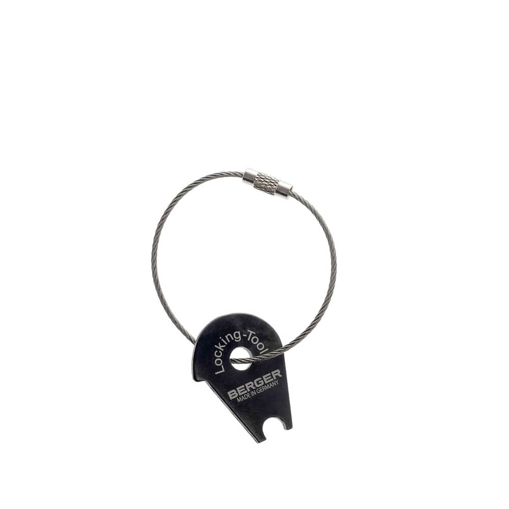 Clé de réglage pour tiges en PRV de BERGER en matériau noir avec anneau métallique et inscription Outil de verrouillage BERGER Made in Germany