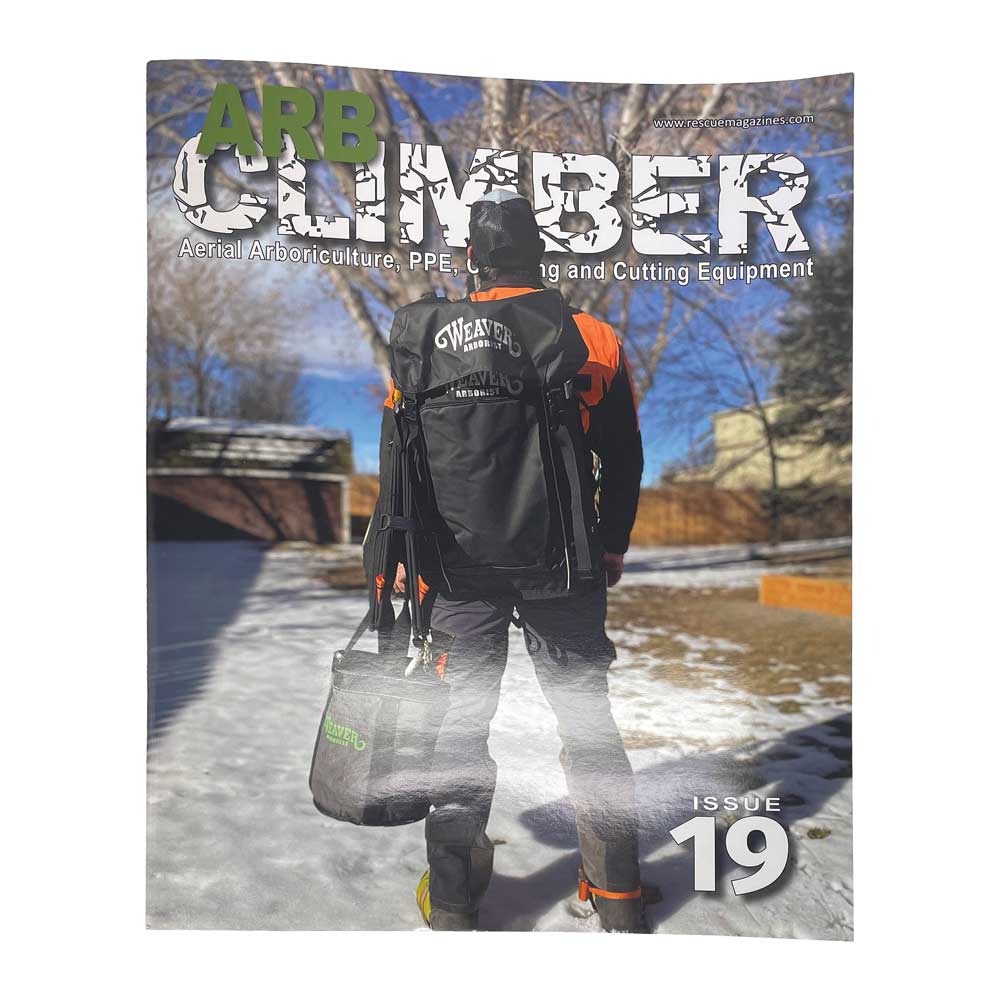 Le magazine Arb Climber n° 19 montre une personne de dos avec un sac à dos noir et un sac à outils dans la neige, titre « ARB CLIMBER » et numéro 19 visibles