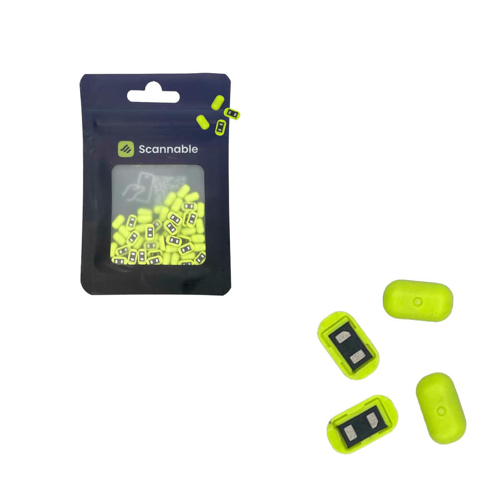 Tag NFC matériel de Scannable, emballage noir avec fenêtre transparente, de nombreuses petites étiquettes NFC jaune-vert visibles à l’intérieur