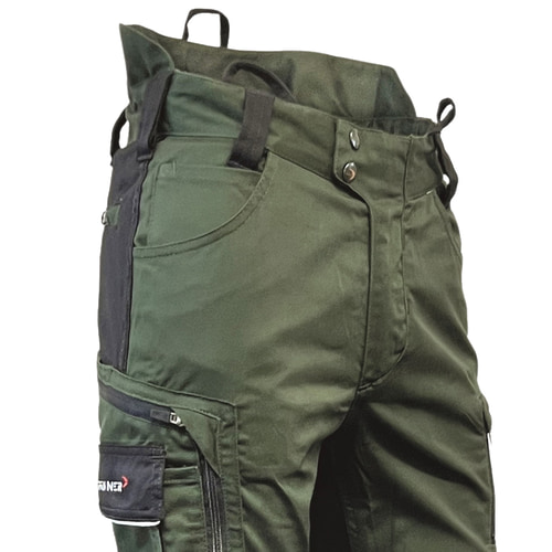 Pantalon StretchFlex® Cancool vert avec détails noirs, gros plan de la moitié supérieure avec poches et passants de ceinture