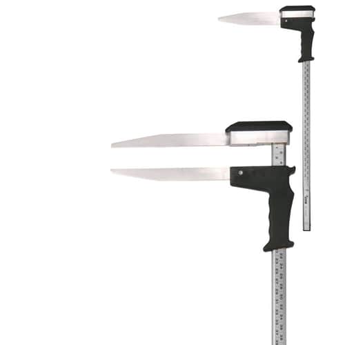 Appareil de mesure Woodruff avec poignée noire et deux longues lames métalliques plates, une règle avec indication centimétrique est fixée