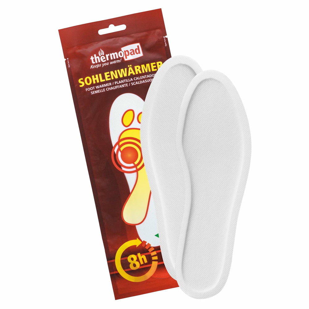 Emballage du chauffe-semelles Thermopad en rouge avec lettrage jaune et deux chauffe-semelles blancs devant, nom du produit chauffe-semelles, fabricant Thermopad