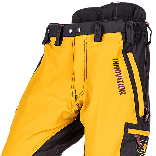 Gros plan du pantalon de travail Canopy AIR-GO en jaune et noir avec inscription INNOVATION et poche zippée