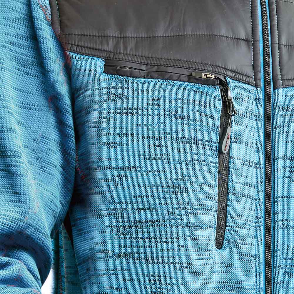Gros plan de la veste d’hiver inuite bleu clair avec fermeture éclair sur la poche poitrine