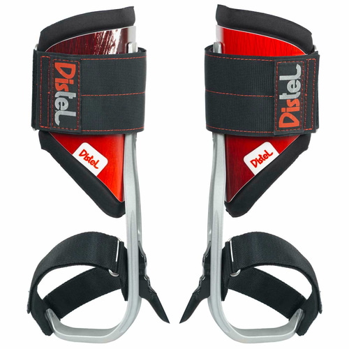 Distel Alu 3.1 Velcro de Distel, deux éperons de pied avec velcro noir et pièces en bois rouge, légèrement photographiés sous un angle différent