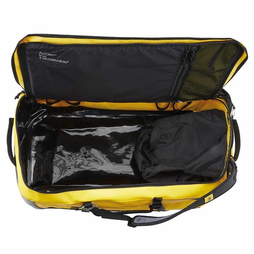 Sac PETZL Duffel 85 jaune ouvert avec doublure noire, poche en filet dans le couvercle et pochette noire à l’intérieur