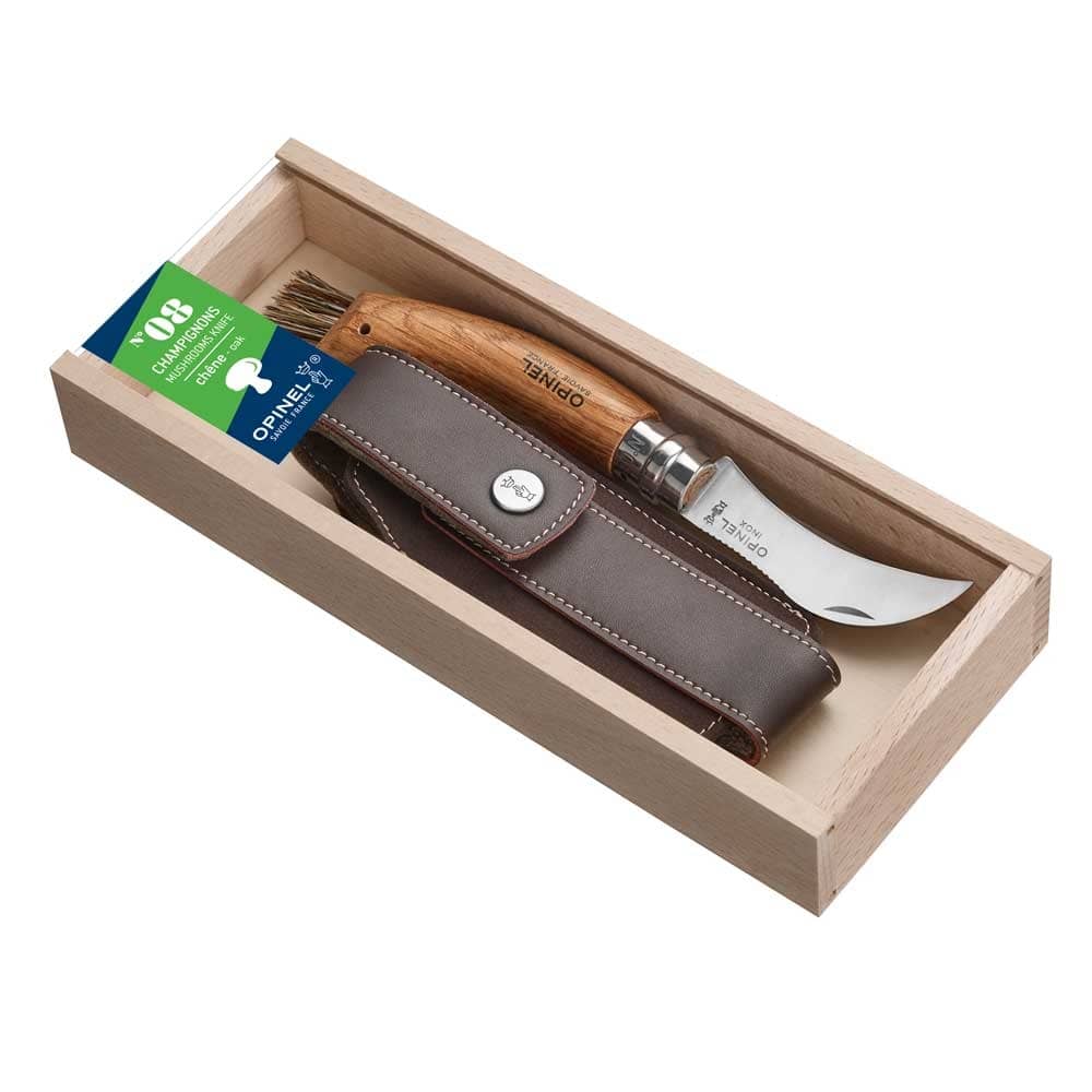 Couteau à champignons Opinel avec couteau incurvé, manche en bois et étui en cuir dans une boîte en bois léger