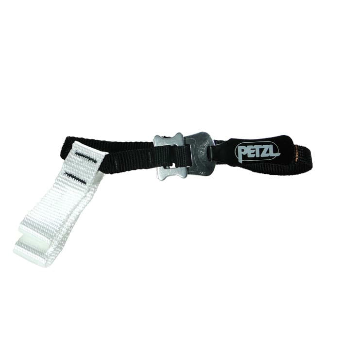 Pantin Strap R de Petzl, un bracelet noir et blanc avec un œillet en métal et une pièce en plastique noir avec le logo Petzl blanc