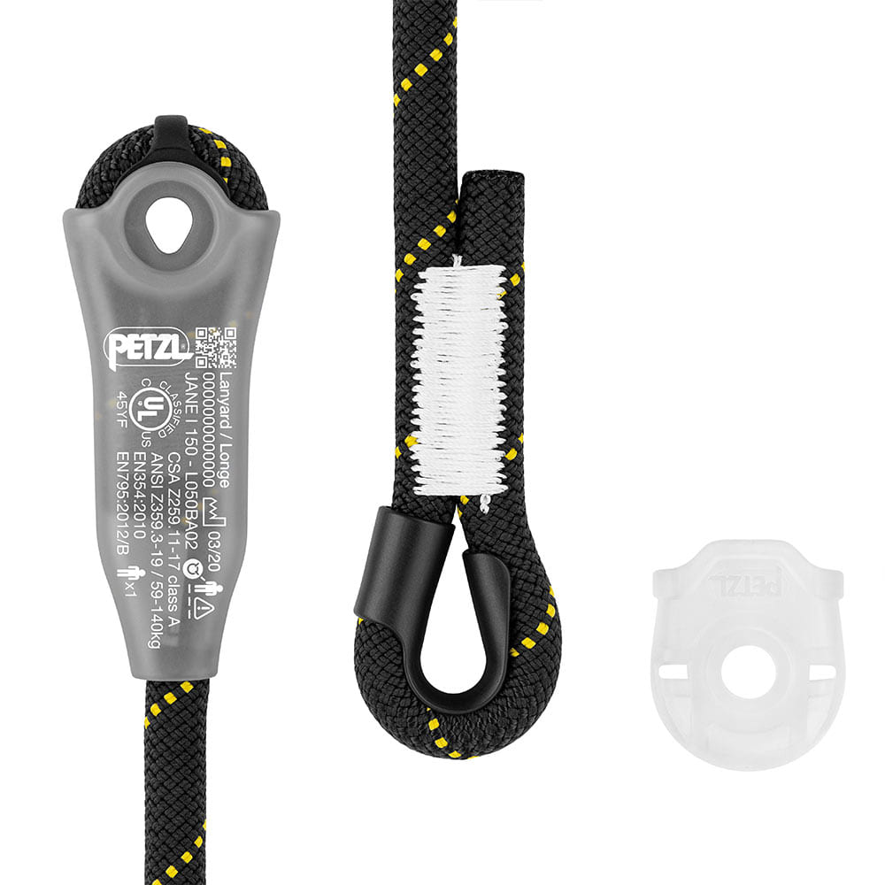 Gros plan de l’appareil d’assurage Petzl Jane-I avec inscription, corde noire à points jaunes et coutures blanches, ainsi qu’un petit anneau en plastique transparent