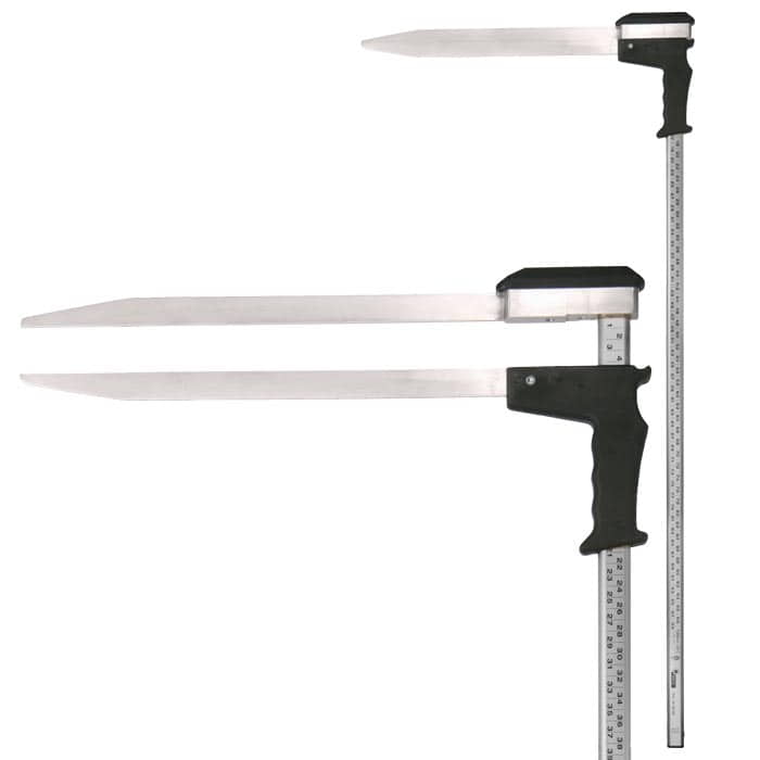 Appareil de mesure Woodruff avec poignée noire et deux longues lames métalliques plates, une règle avec indication centimétrique est fixée