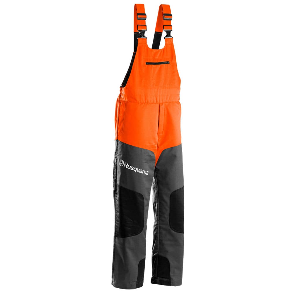 Salopette classique en orange et gris avec genouillères noires et logo Husqvarna sur la jambe gauche