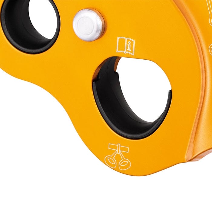 Zoom sur le système de câbles jaunes Petzl ZigZag avec inserts en plastique noir et symboles blancs