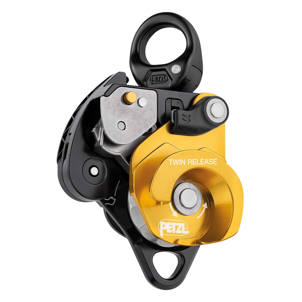 Poulie Petzl Twin Release en noir et jaune avec logo du fabricant et nom du produit visibles