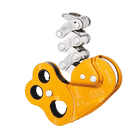Système de câbles Petzl ZigZag jaune avec leviers en métal argenté et plusieurs trous dans le boîtier